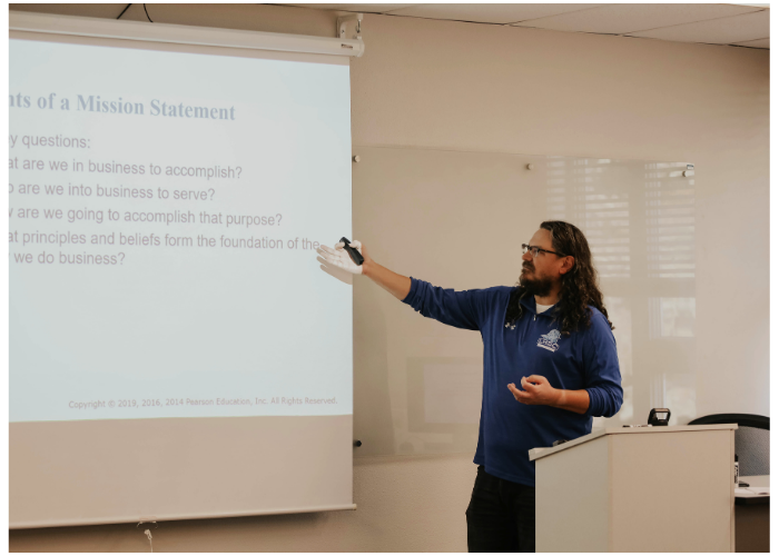 Instructor teaching a class in the Business Administration program.