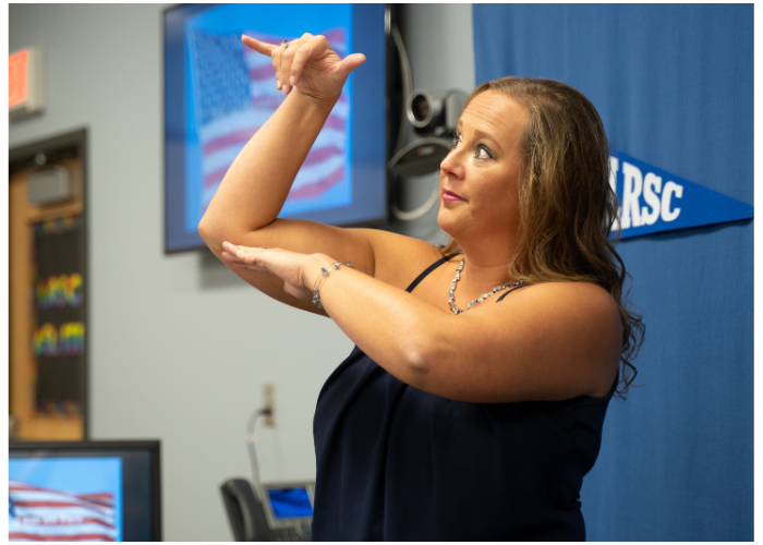 Lake Region State College instructor signing to students during an American Sign Language class.
