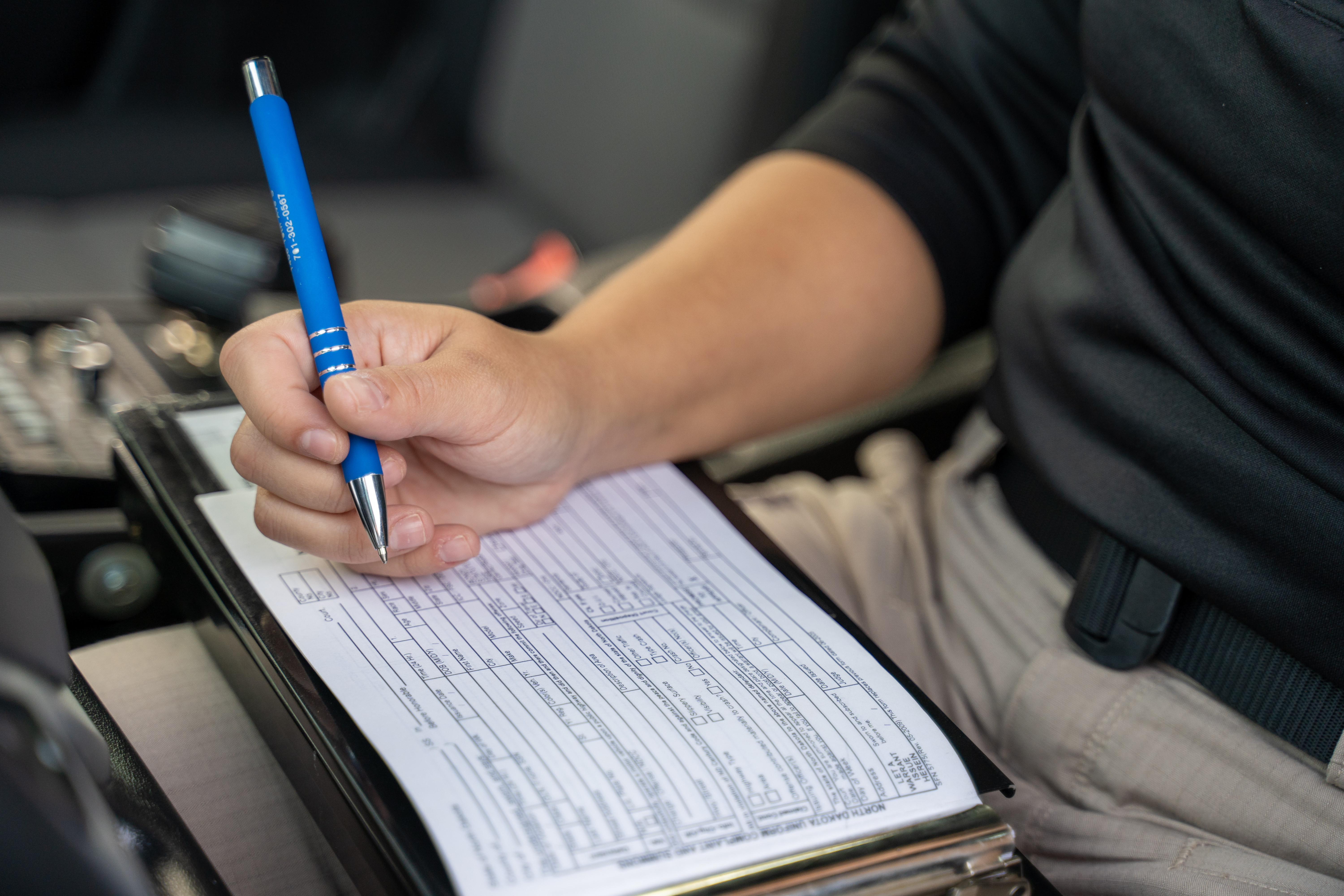 peace officer student writing out sample ticket