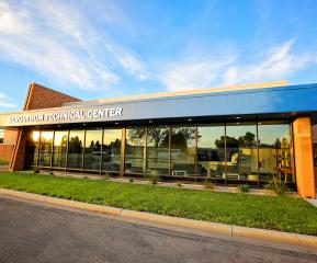 photo of the front of Bergstrom Tech Center on summer day
