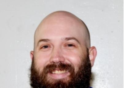 Headshot of Cole Klubek, new women's hockey coach at LRSC
