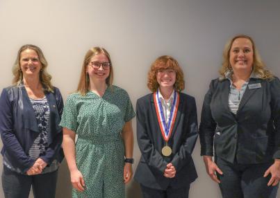 LRSC PTK Advisor Tammy Riggin, Jaelyn Buckman, Gracie Kuglin, and LRSC PTK Advisor Lisa Ginther